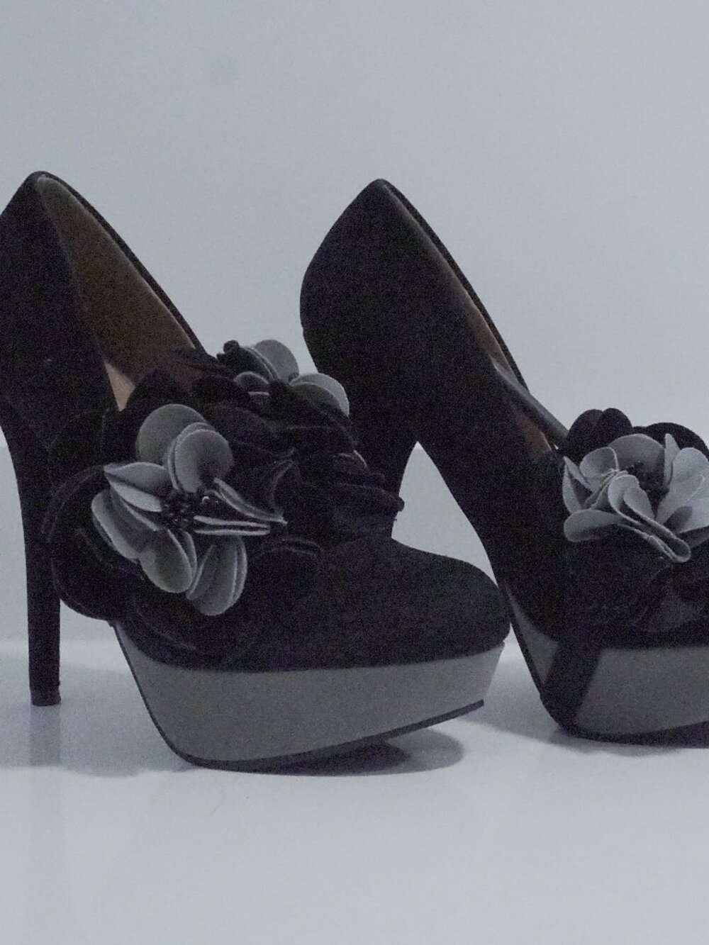 black heels with flowers